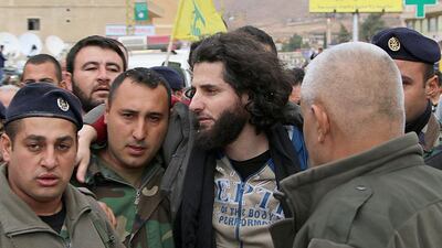 One of the Lebanese troops (pictured centre) released by Jabhat Al Nusra on Tuesday. AFP