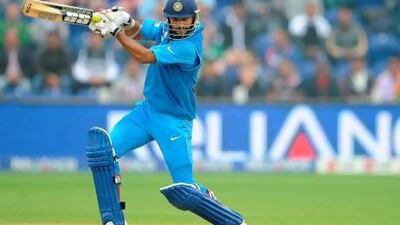 Shikhar Dhawan has taken the attack back to the opposition on wet and damp pitches in England where India used to struggle in the past. Andrew Yates / AFP