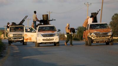 Militias allied to Libya's internationally recognised government fight rival groups in Tripoli in September 2018. Reuters