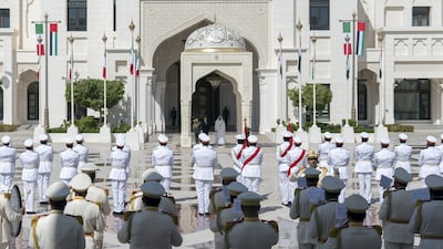 Sheikh Mohamed bin Zayed and Giuseppe Conte stand for the national anthem, during a reception held at the Presidential Palace. Rashed Al Mansoori / Ministry of Presidential Affairs