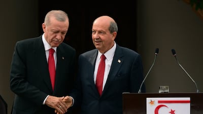 Turkish President Recep Tayyip Erdogan, left, and Turkish Cypriot leader Ersin Tatar in the divided capital Nicosia, Cyprus, earlier this month. AP Photo