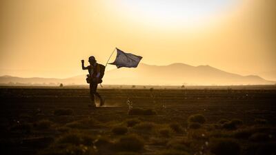A man competes in the stage 2 of the 34th edition of the Marathon des Sables between Tisserdimine and Kourci Dial Zaid in the southern Moroccan Sahara desert, on April 8, 2019. AFP / JEAN-PHILIPPE KSIAZEK