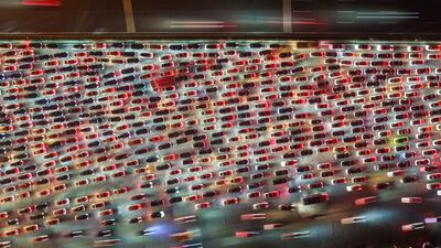 Drivers merge onto expressway lanes after passing through the Wuzhuang toll station at Chuzhou, in China's eastern Anhui province. AFP