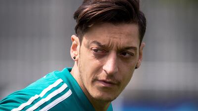 Mesut Ozil has quit the Germany national team after accusing the DFB of racism. Michael Probst / AP Photo