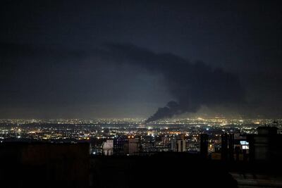 Smoke rises over Tehran's skyline after US and Israeli strikes. AFP