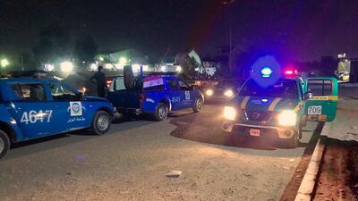 Iraqi security forces inspect the site of an explosion at a marketplace in Baghdad's Sadr City suburb on May 9, 2019. AP Photo