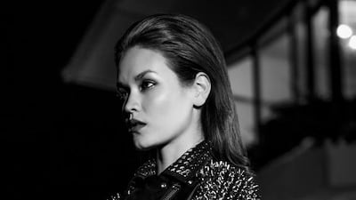 AFTER HOURS: Jacket, Dh23, 534, Burberry. Dress, Dh53,778, Giorgio Armani.