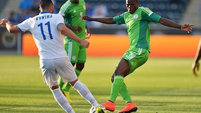 Elderson Echiejile, right, hurt his hamstring. Drew Hallowell / Getty Images