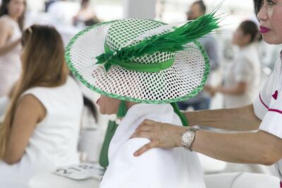 A woman gets a massage at Dubai World Cup 2018. Reem Mohammed / The National