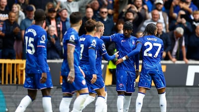 Chelsea's Noni Madueke celebrates scoring their third goal with teammates. Action Images