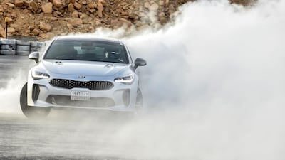 Rana Almimoni, a 30-year-old Saudi motor racing enthusiast, drifts a car on a track in Dirab motor park, on the southern outskirts of the capital Riyadh. AFP