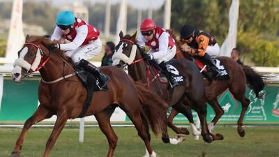 Callateral, riden by William Twiston-Davies, won the first race of Sunday's meeting at the Abu Dhabi Equestrian Club. Delores Johnson / The National