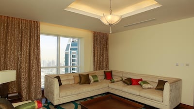 The family area of the three-bedroom apartment in Marina 101. Jeffrey E Biteng / The National