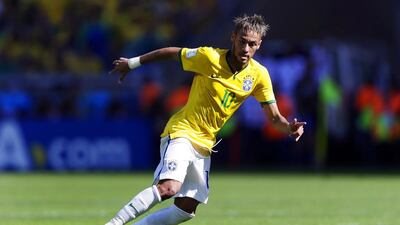 Brazil's Neymar runs with the ball during the World Cup round of 16 match against Chile at the Mineirao Stadium in Belo Horizonte, Brazil, on June 28, 2014. Andre Penner / AP Photo