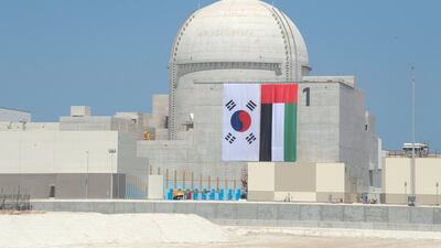 The South Korean flag hangs on the Barakah Nuclear Power Plant to welcome the country's president Moon Jae-in for a ceremony to celebrate the facility’s completion in April. Abdullah Al Junaibi