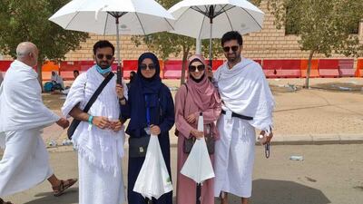 Anas Misri (L) with his wife, and Abbas Misri, also with his wife. They recently got married and are performing Hajj together as a family. Photo: Mariam Nihal / The National