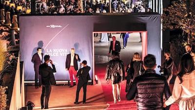 People arrive for the grand unveiling.