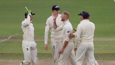England all-rounder Ben Stokes, centre, celebrates taking the wicket of South Africa's Anrich Nortje. Reuters