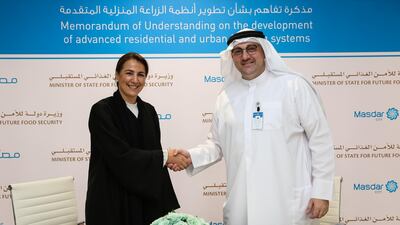 A food security agreement has been signed by Mariam bint Mohammed Saeed Hareb Almheiri, minister of state for future food security and Mohamed Jameel Al Ramahi, chief executive officer of Masdar. Courtesy: Masdar