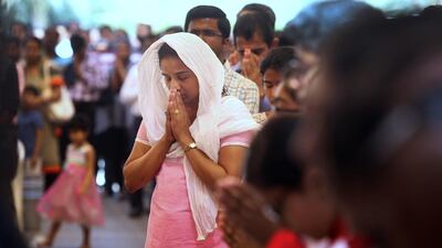 Some of the many worshippers at Good Friday mass at St Joseph’s Cathedral in Abu Dhabi on Friday. Delores Johnson / The National
