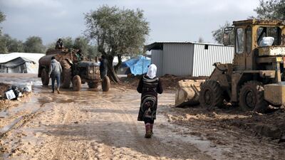Location: Al-Karama camp in Atama. The aftermath of heavy rainfall on north Syria, residents lost their furniture, clothes and bedding as well as the tents waiting outside in open lands until the civil defense and NGs arrive to rescue them.
