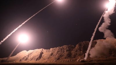 A handout photo made available by Irans Revolutionary Guard official website showing missiles being launches from an undisclosed location targeting ISIS. EPA