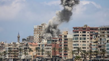 Smoke rises following an Israeli airstrike in Tyre on June 9, 2026. Residents of south Lebanon's Tyre including the Christian quarter fled on June 9, an AFP correspondent said, after Israel's army for the first time warned the entire city to evacuate ahead of strikes. The warning came a day after Iran, which insists a halt to the wider Middle East conflict must include a ceasefire in Lebanon, warned it would resume attacks on Israel if it kept striking its neighbour. (Photo by KAWANT HAJU / AFP) /