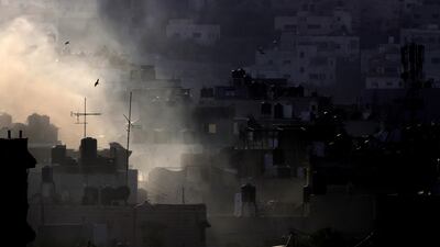Smoke rises over Jenin camp during heavy clashes in the occupied West Bank on Saturday. EPA