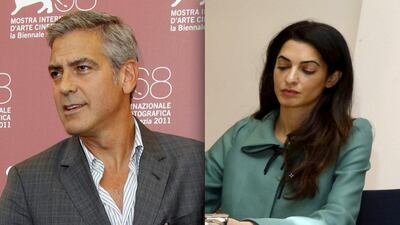 George Clooney poses at the photo call for the film. AP. Laywer Amal Alamuddin working.