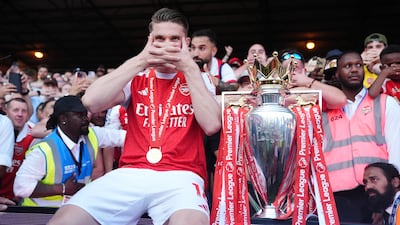 Arsenal's Viktor Gyokeres celebrates with the Premier League trophy. PA