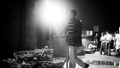 05:09am - Baskets of fish are moved over to the retail market for sale.