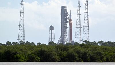 The Space Launch System, with the Orion crew capsule, stands on the launch pad in Florida during the fuelling process. Reuters