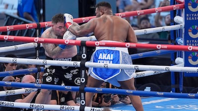 Andy Ruiz Jr, left, fights Jarrell Miller. AP