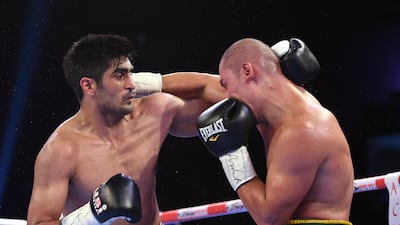 Vijender Singh, left, is unbeaten in 10 professional bouts but did not fight in 2018. AFP