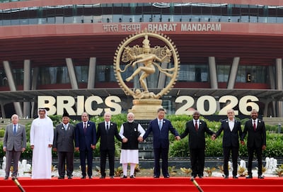 From left, Brazilian Foreign Minister Mauro Vieira, Secretary-General of the UAE's Supreme Council for National Security Ali bin Hammad Al Shamsi, Indonesian President Prabowo Subianto, Egyptian President Abdel Fattah Sisi, Russian President Vladimir Putin, Indian Prime Minister Narendra Modi, Chinese President Xi Jinping, South African President Cyril Ramaphosa, Iranian President Masoud Pezeshkian and Ethiopian Prime Minister Abiy Ahmed at the Brics Summit in New Delhi on September 12. EPA