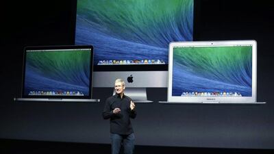 Apple chif executive Tim Cook speaks on stage before a new product introduction in San Francisco. Marcio Jose Sanchez / AP Photo