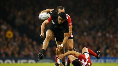Julian Savea of New Zealand breaks through tackles during his team's Rugby World Cup Pool C win over Georgia on Friday night. Stu Forster / Getty Images / October 2, 2015