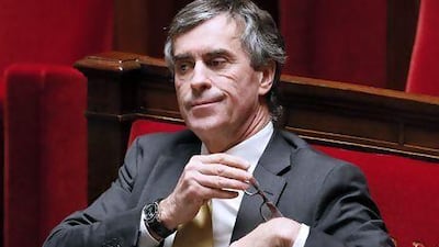 (FILES) - A picture taken on December 11, 2012, at the National Assembly in Paris, shows French Junior Minister for Budget, Jerome Cahuzac attending a session of questions to the government. Disgraced former French budget minister Jerome Cahuzac, who is embroiled in a major tax fraud scandal that has shaken the government, is due to announce his resignation as a member of parliament on April 16, 2013 on French TV news channel BFM-TV, according to daily newspaper La Depeche du Midi. AFP PHOTO PATRICK KOVARIK