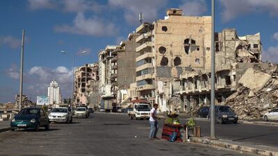 A Libyan street vendor sells corn on the roadside by the waterfront promenade in the eastern port city of Benghazi. AFP