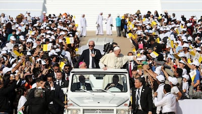 Pope Francis arriving at the public mass to mark his landmark visit to the UAE, at Zayed Sports city stadium, Abu Dhabi. Chris Whiteoak / The National