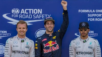 Australian Formula One driver Daniel Ricciardo (C) of Red Bull Racing reacts as he took pole position in the qualifying session ahead German Formula One driver Nico Rosberg (L) of Mercedes AMG GP and British Formula One driver Lewis Hamilton (R) of Mercedes AMG GP at Monte Carlo circuit in Monaco, 28 May 2016. The 2016 Formula One Grand Prix of Monaco will take place on 29 May 2016. EPA/SRDJAN SUKI