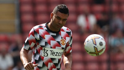 Manchester United's Brazilian midfielder Casemiro warms up ahead of the English Premier League football match between Southampton and Manchester United at St Mary's Stadium in Southampton, southern England on August 27, 2022. (Photo by ADRIAN DENNIS / AFP) / RESTRICTED TO EDITORIAL USE. No use with unauthorized audio, video, data, fixture lists, club/league logos or 'live' services. Online in-match use limited to 120 images. An additional 40 images may be used in extra time. No video emulation. Social media in-match use limited to 120 images. An additional 40 images may be used in extra time. No use in betting publications, games or single club/league/player publications. /