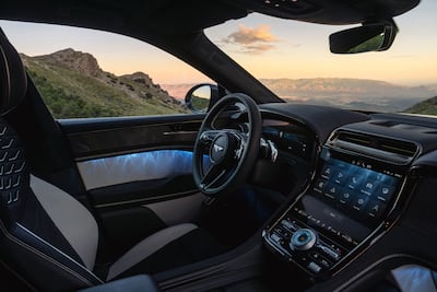 Inside, a curved central touchscreen sits alongside the physical controls that remain central to Bentley’s approach to luxury. Photo: Bentley