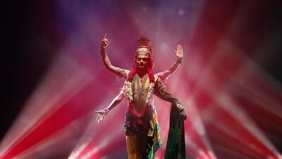 An Indian artist dressed as Hindu Lord Vishnu, whose incarnation is Lord Krishna, takes part in a play during celebrations to mark Janmashtami festival in New Delhi. Anindito Mukherjee / Reuters