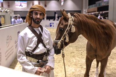 Yousif Al Hammedi with his horse, Rabdan.
Victor Besa / The National