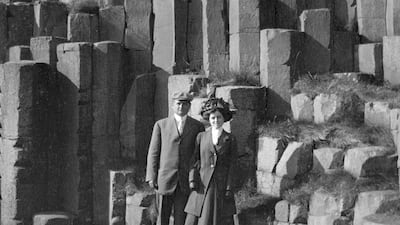 In this 1909 photo, John F. Fitzgerald and Rose Fitzgerald pose at Giant's Causeway in County Antrim, Northern Ireland. Kennedy Family Collection / John F. Kennedy Library Foundation via AP