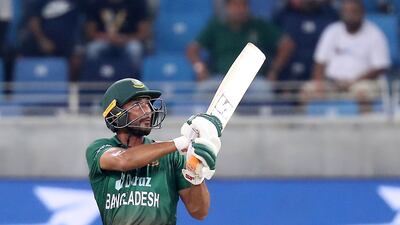 Mahmudullah plays a shot during his 27 off 22 balls. Pawan Singh / The National