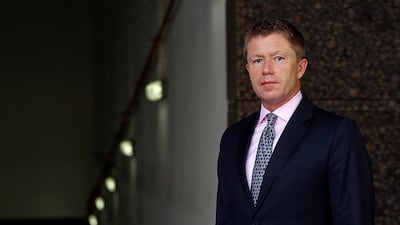 Ahmad Hamad Al Ghosaibi & Brothers, under its chief executive Simon Charlton, has begun talks with 11 Saudi-controlled banks that have so far stayed outside the negotiating process. Satish Kumar / The National