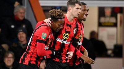 Bournemouth's Jamal Lowe celebrates scoring their first goal with Chris Mepham. Reuters