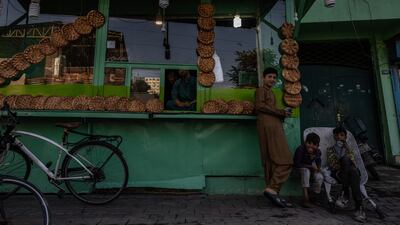 Afghans have been struggling with a surge in food prices and malnutrition – a situation made worse by the US stopping funds. Stefanie Glinski / The National